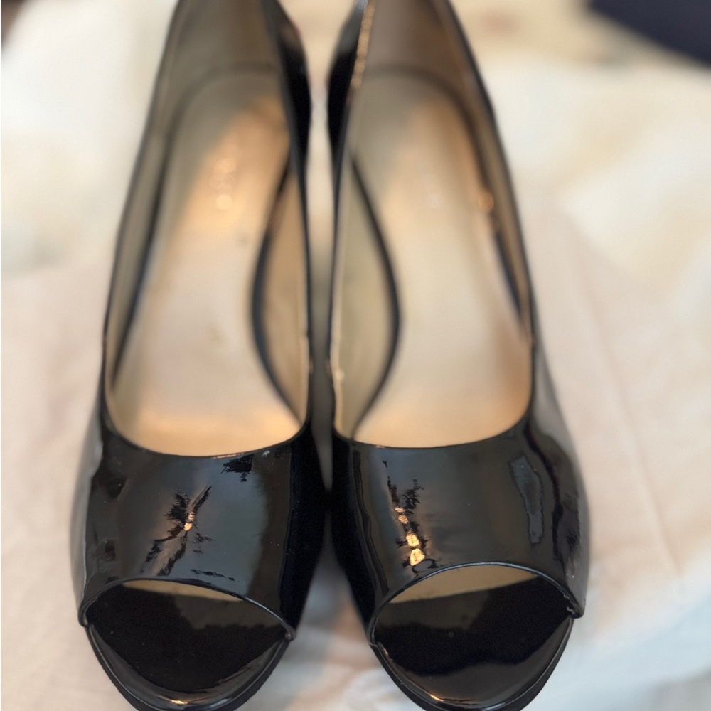 Nine West Black Glossy Heels. Excellent condition. Worn once or twice.